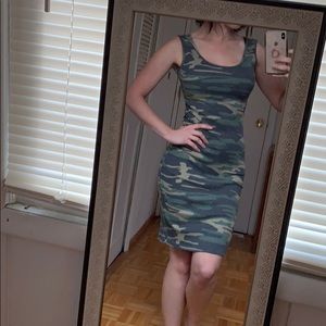 Little camo dress! Fits small or medium well.
